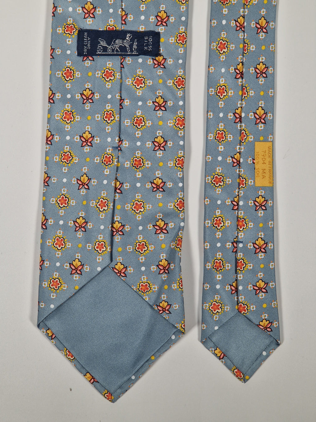 Hermés silk tie light blue with flowers 7904 MA