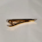 A pair of cufflinks and tiepin from Dunhill