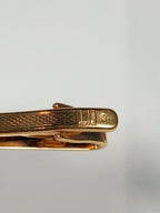 A pair of cufflinks and tiepin from Dunhill