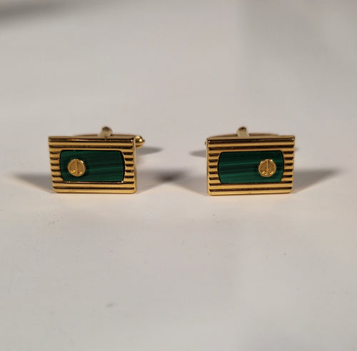 A pair of cufflinks and tiepin from Dunhill