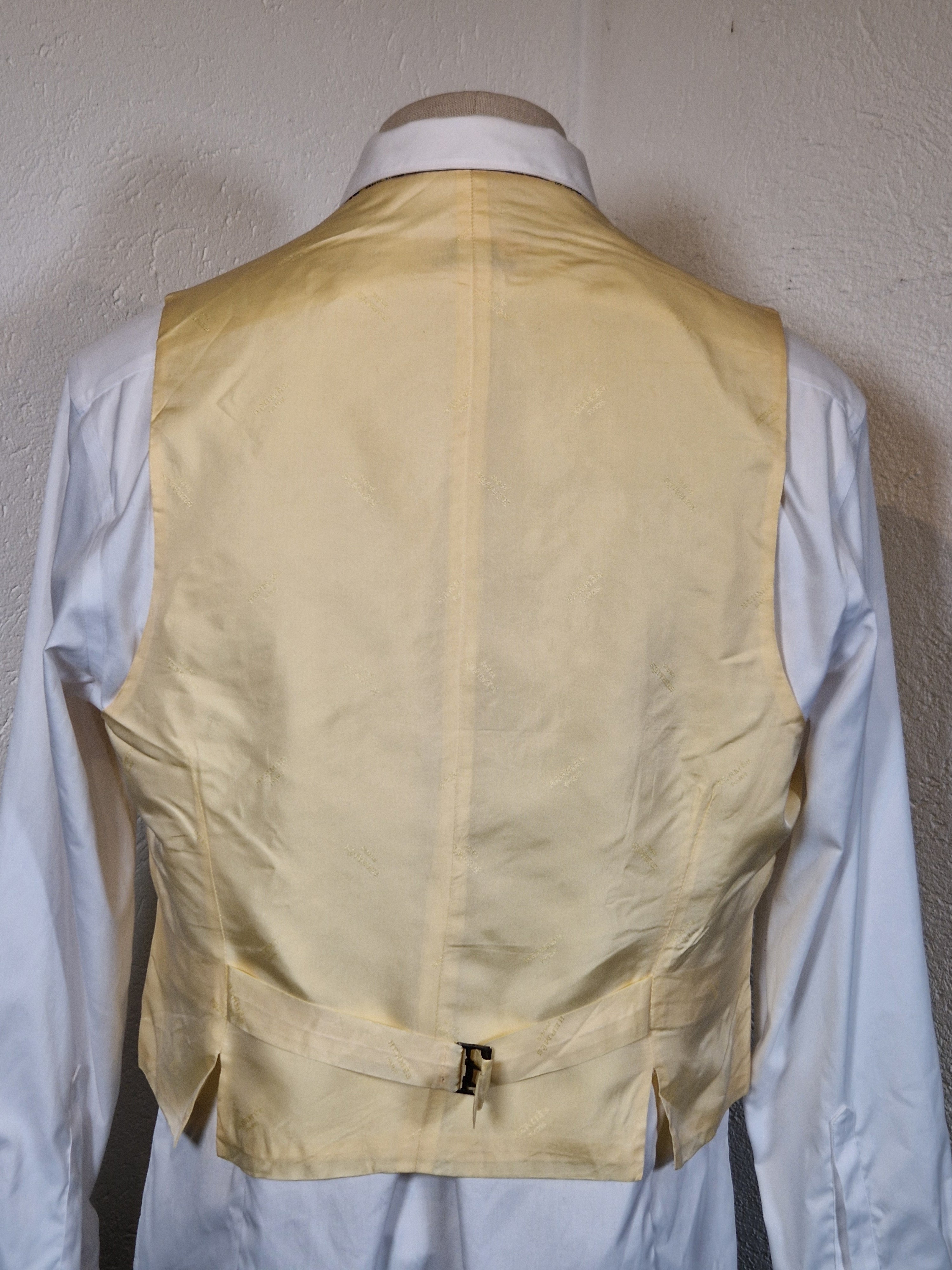 A Hermés vest with a linen front