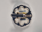 A pair of cufflinks from Royal Copenhagen x Swank