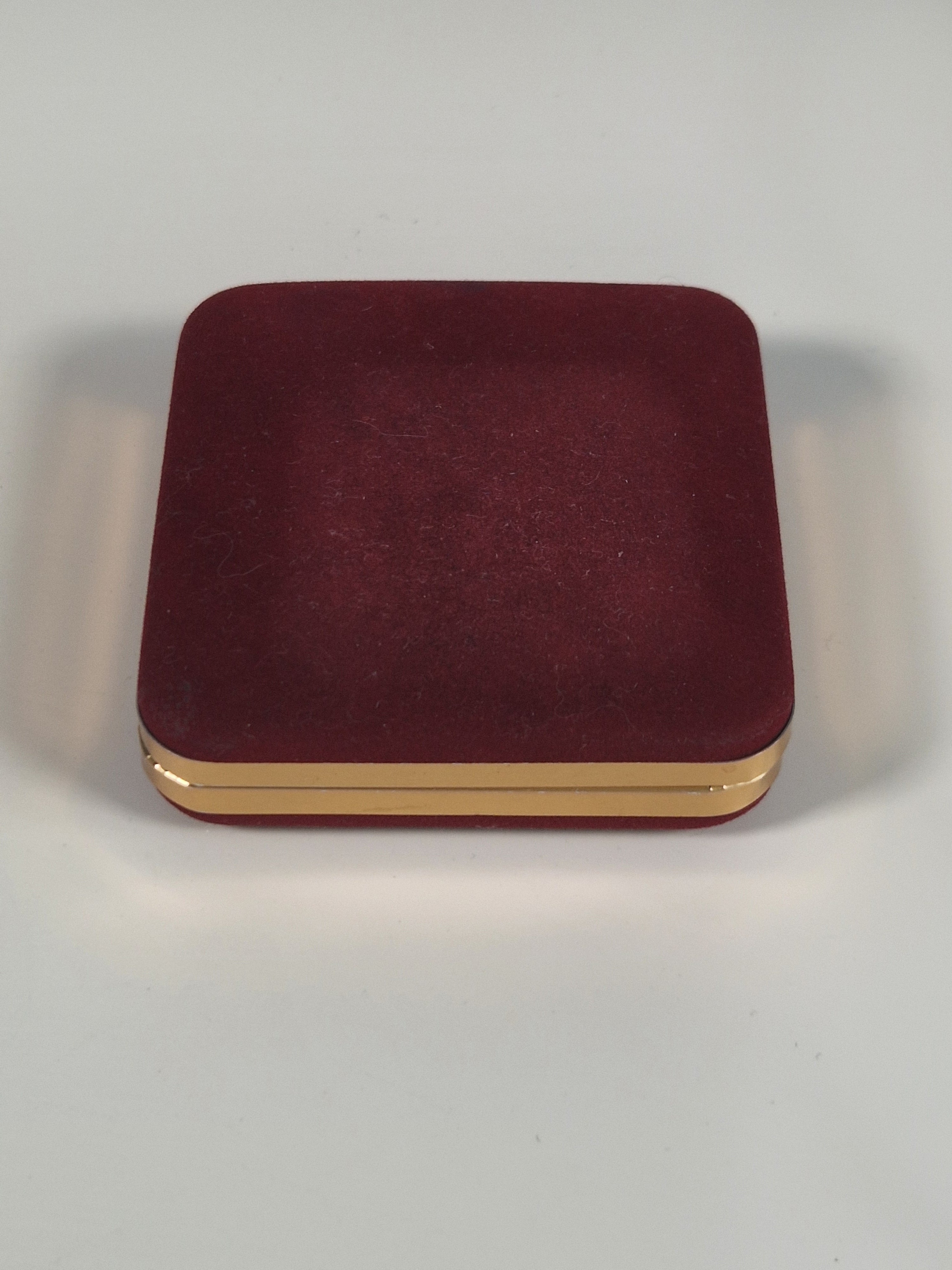 A pair of cufflinks and tiepin from Royal Copenhagen x Swank