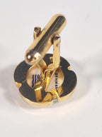A pair of cufflinks and tiepin from Royal Copenhagen x Swank