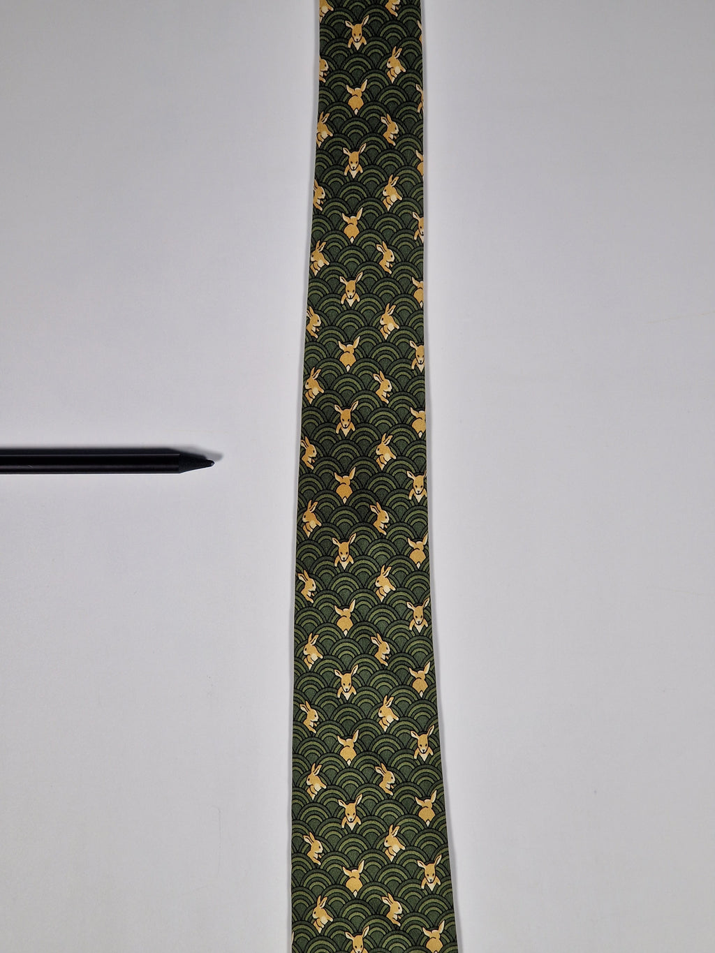 Hermès silk tie green whimsical rabbit and waves 7464 HA