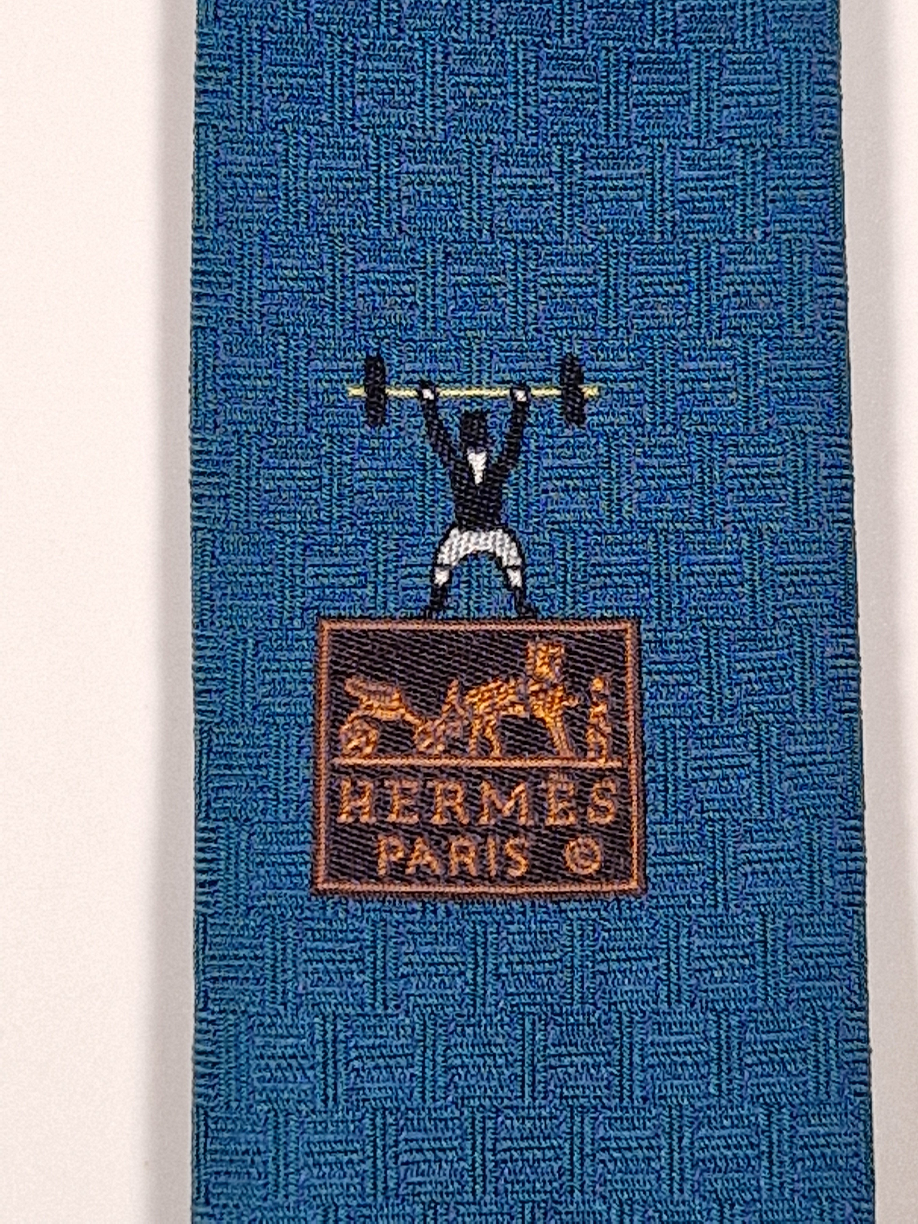 Hermès silk tie blue weight lifter and H pattern 429083 T