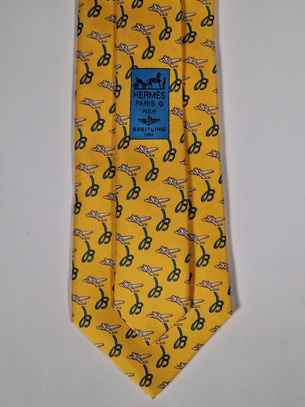 Hermès silk tie yellow Breitling pattern 5021 EA