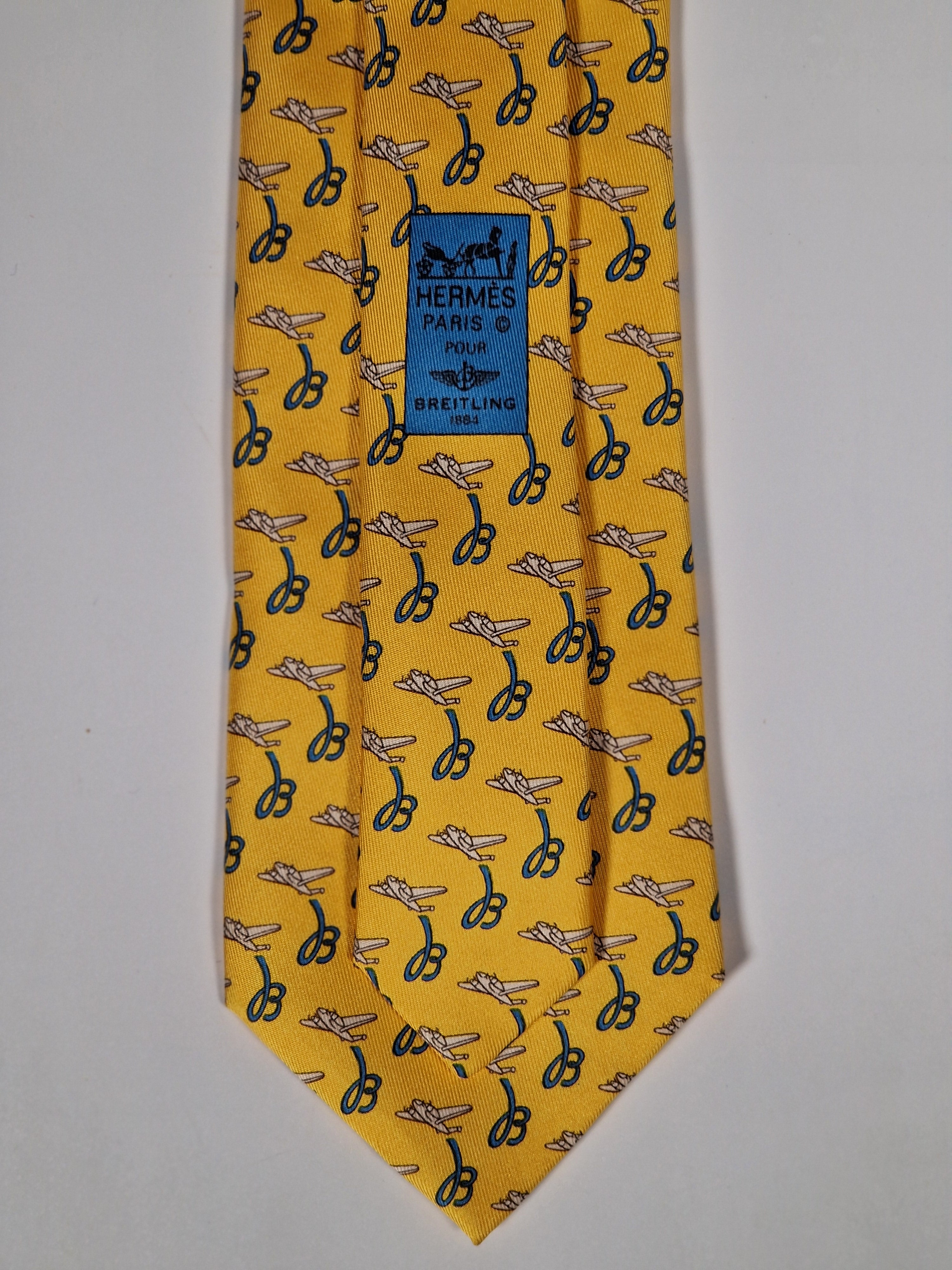 Hermès silk tie yellow Breitling pattern 5021 EA