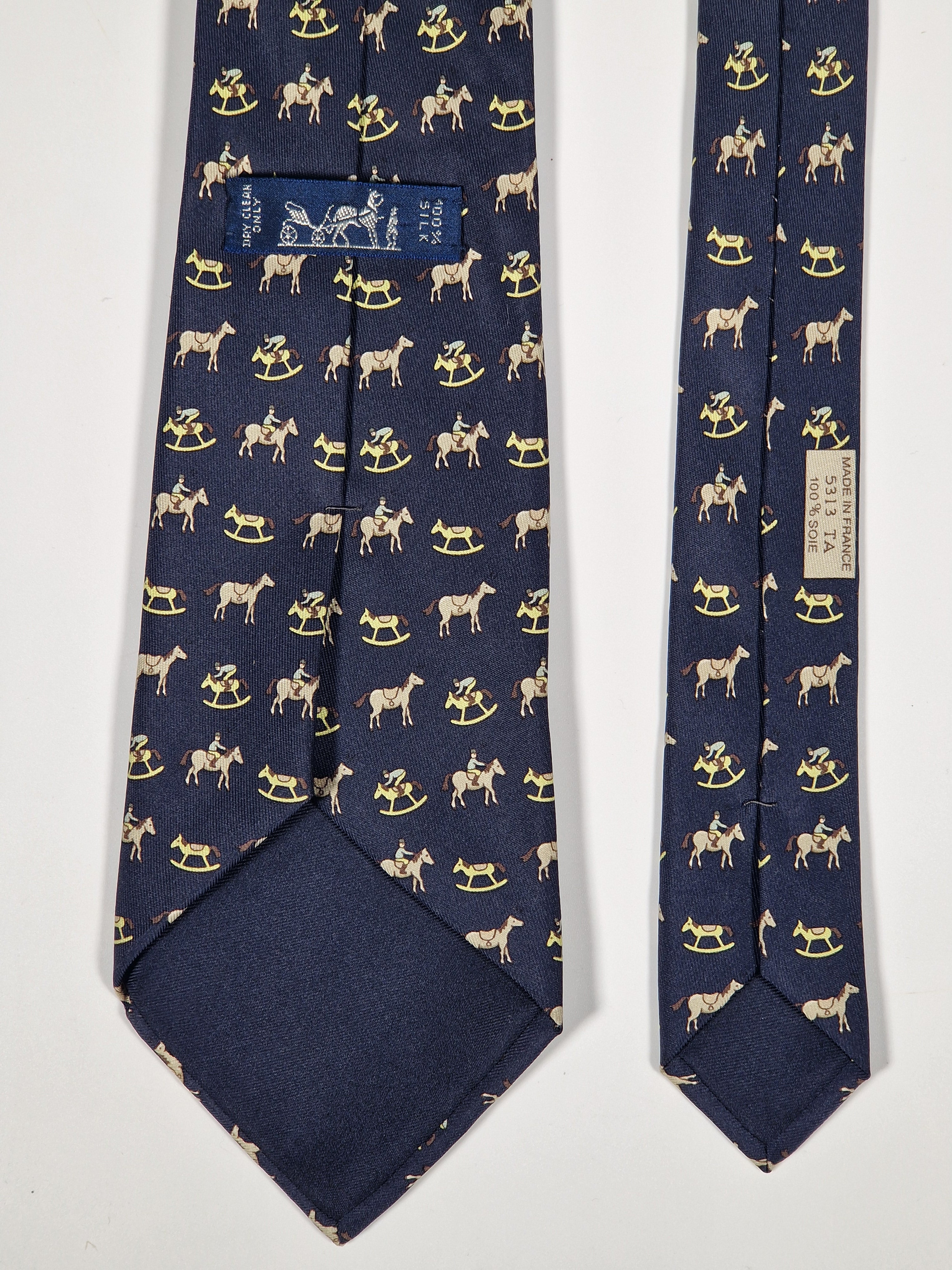 Hermès silk tie black whimsical horse and jockey pattern 5313 TA