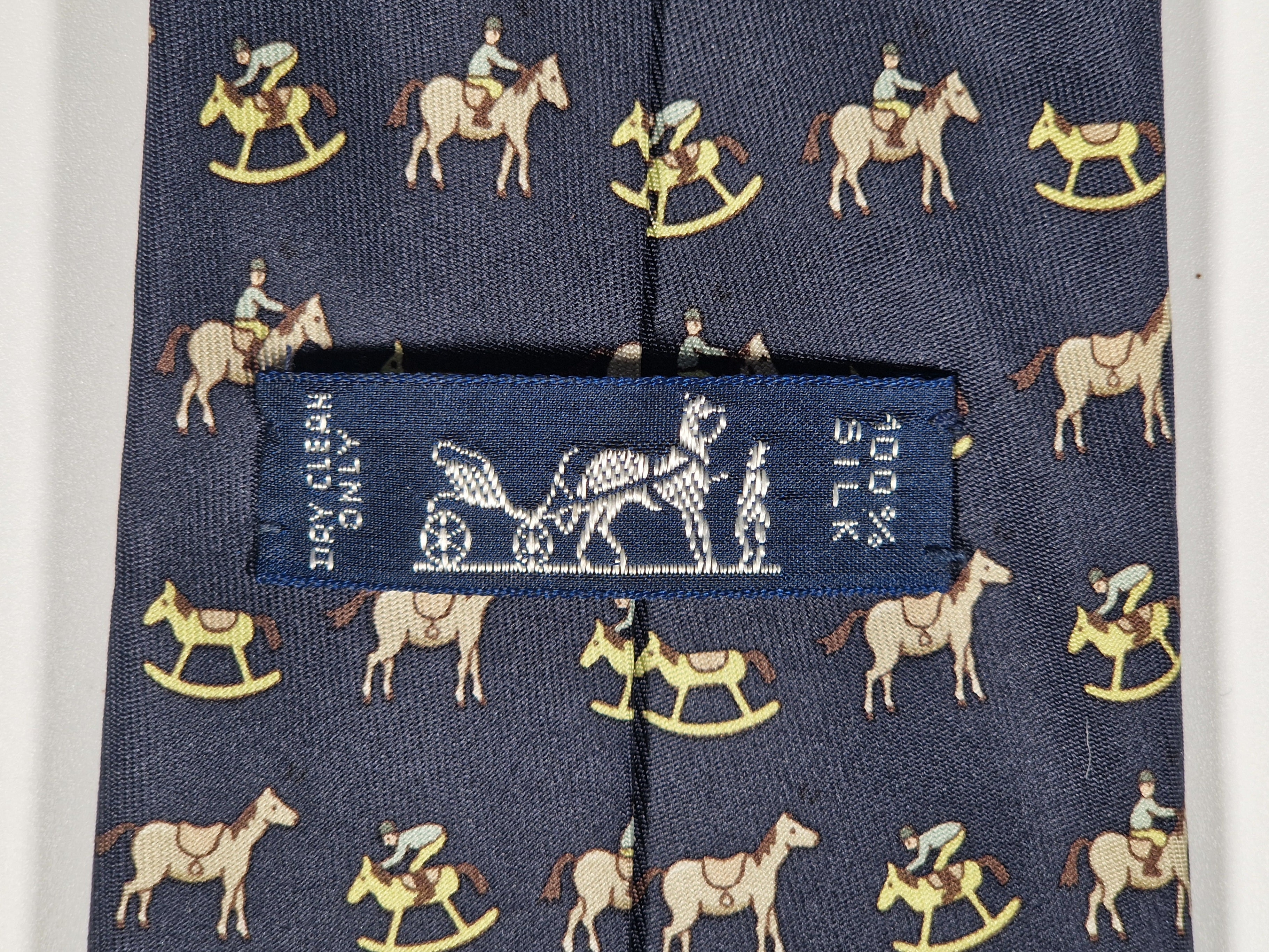 Hermès silk tie black whimsical horse and jockey pattern 5313 TA