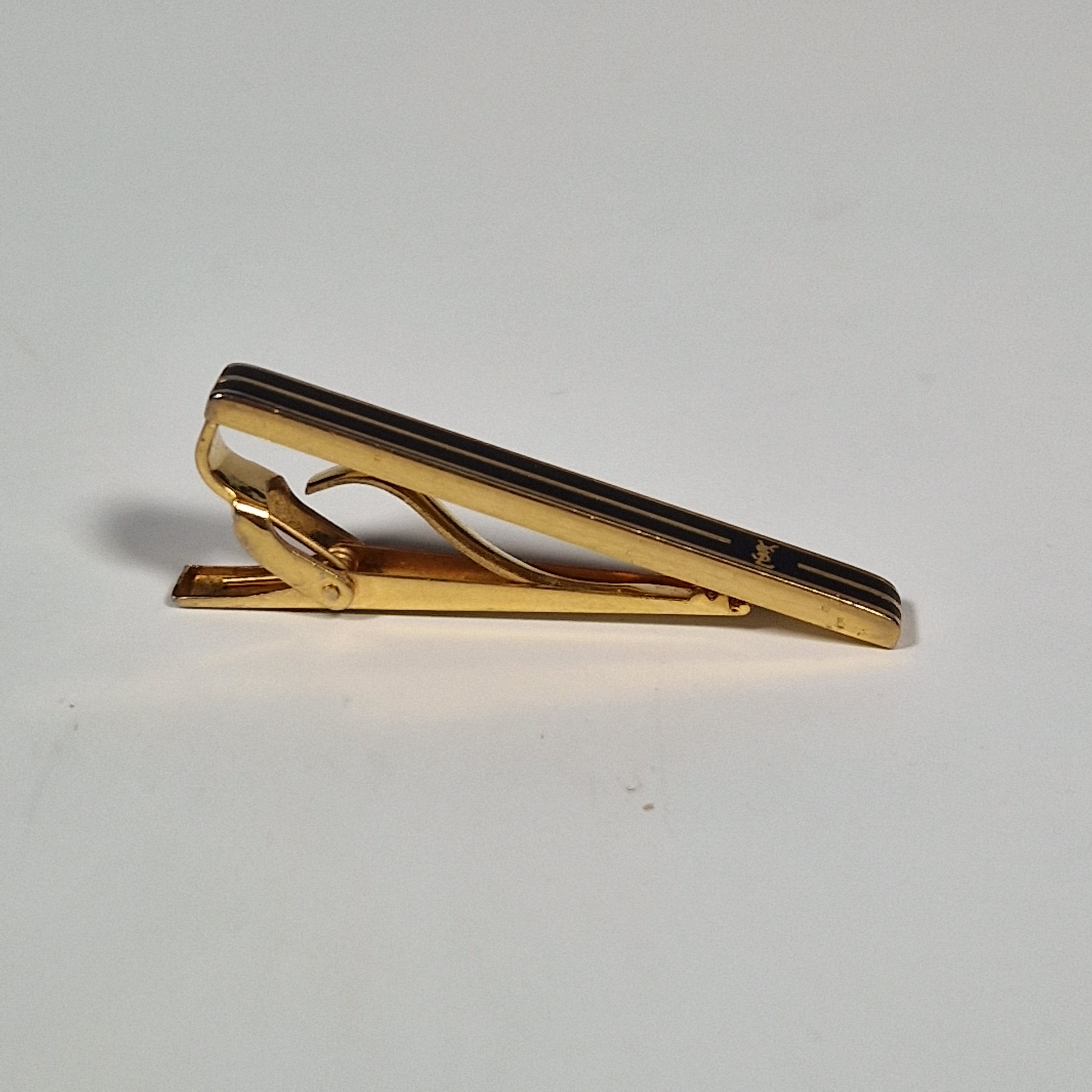 Yves Saint Laurent a tie pin