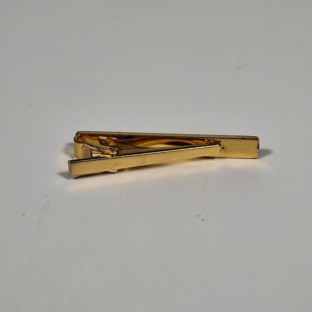 Yves Saint Laurent a tie pin
