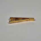 Yves Saint Laurent a tie pin