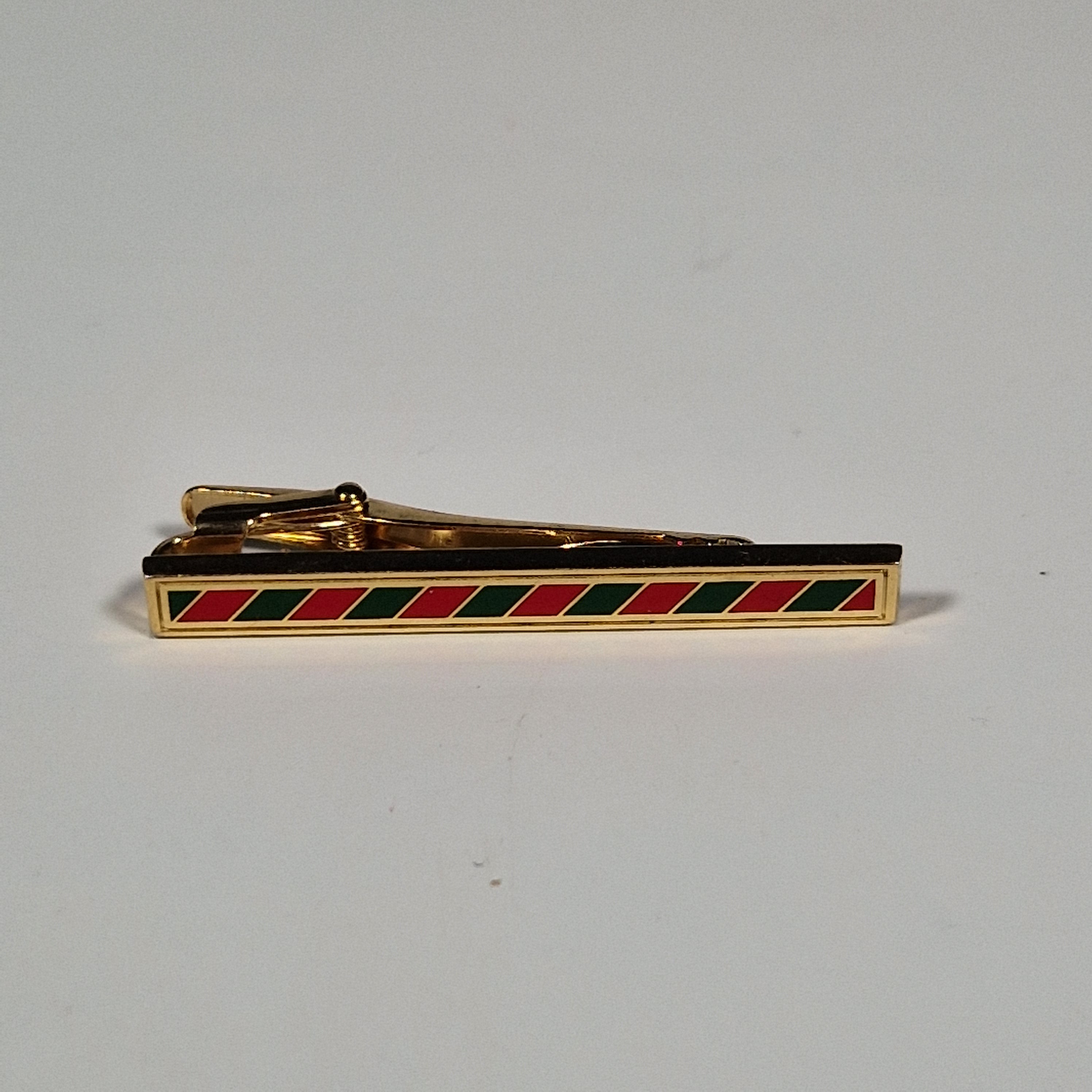 Yves Saint Laurent a tie pin