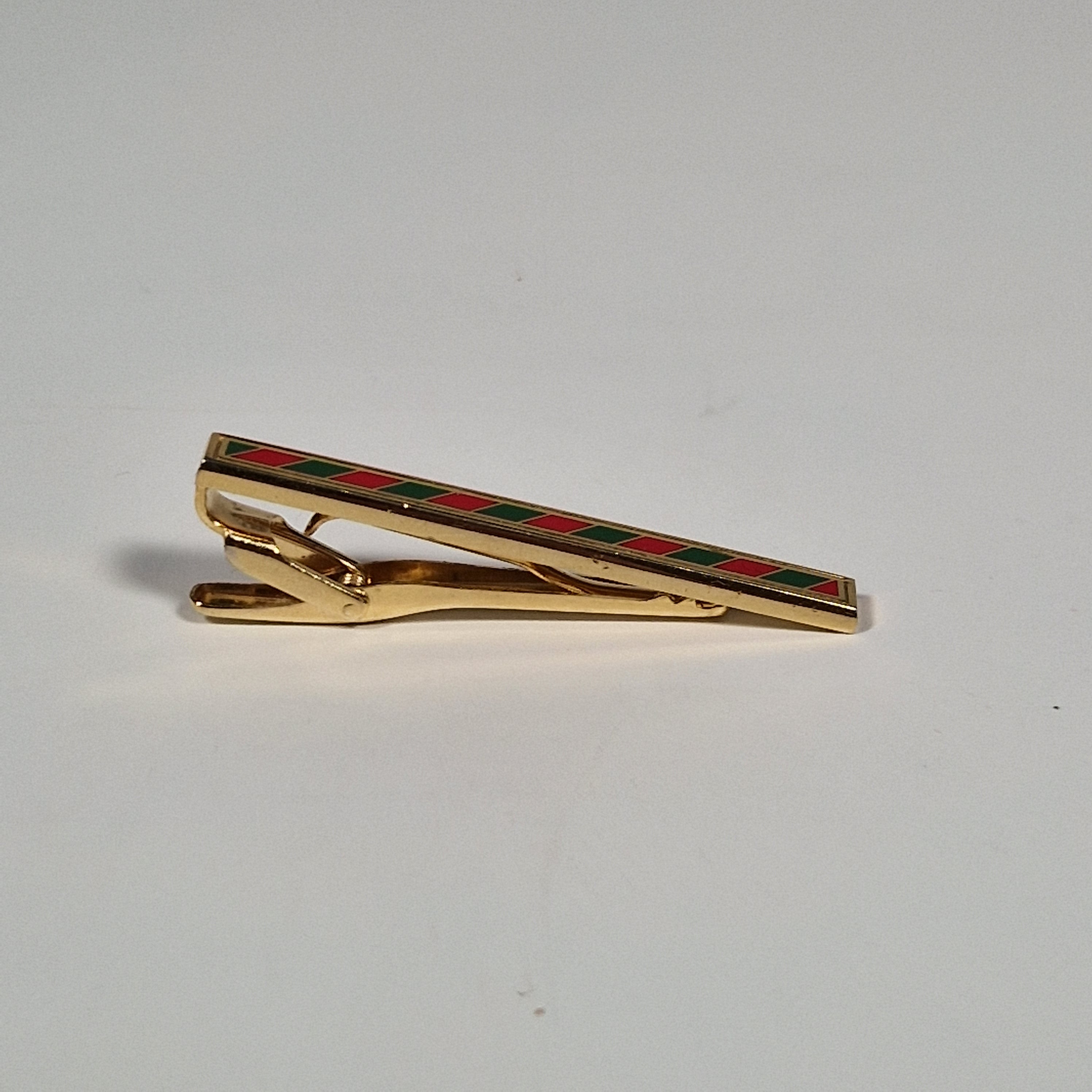 Yves Saint Laurent a tie pin