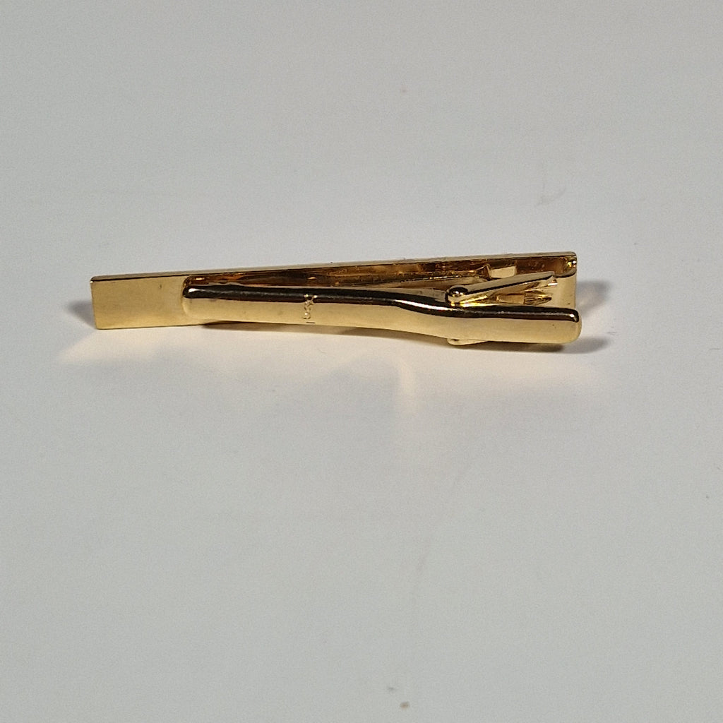 Yves Saint Laurent a tie pin