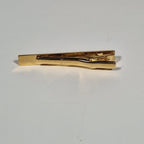Yves Saint Laurent a tie pin