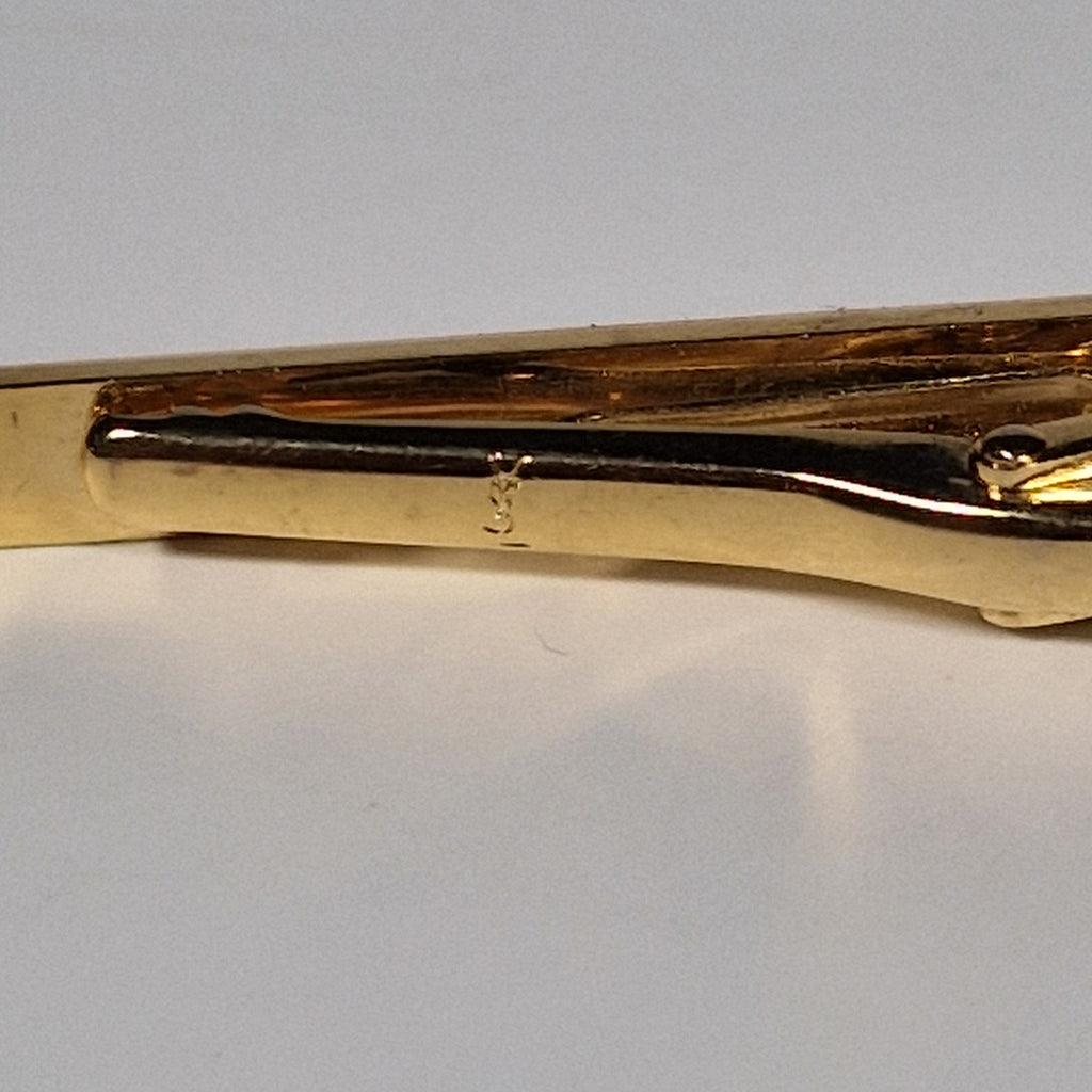 Yves Saint Laurent a tie pin