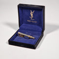 Yves Saint Laurent a tie pin with box.