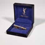 Yves Saint Laurent a tie pin with box.