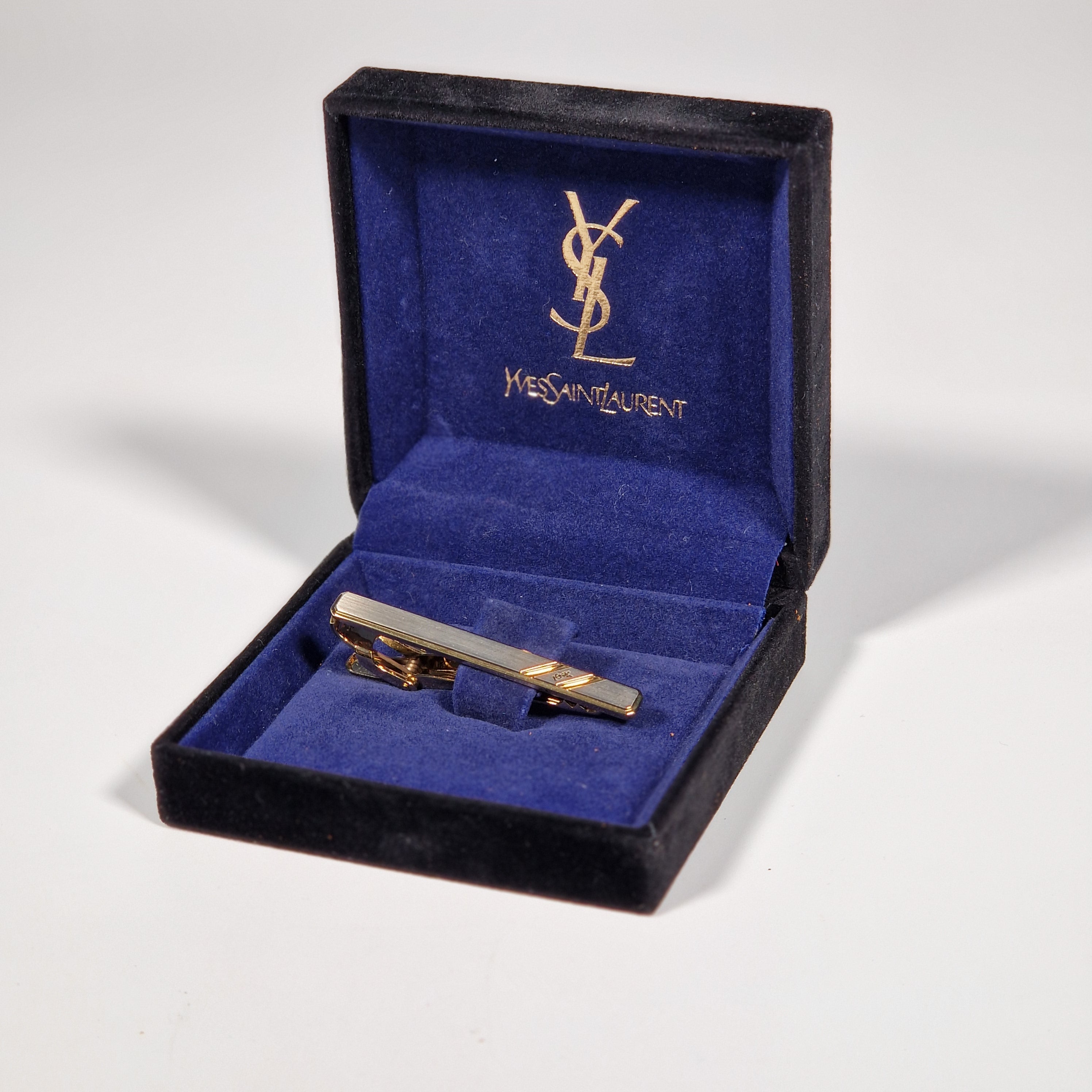 Yves Saint Laurent a tie pin with box.