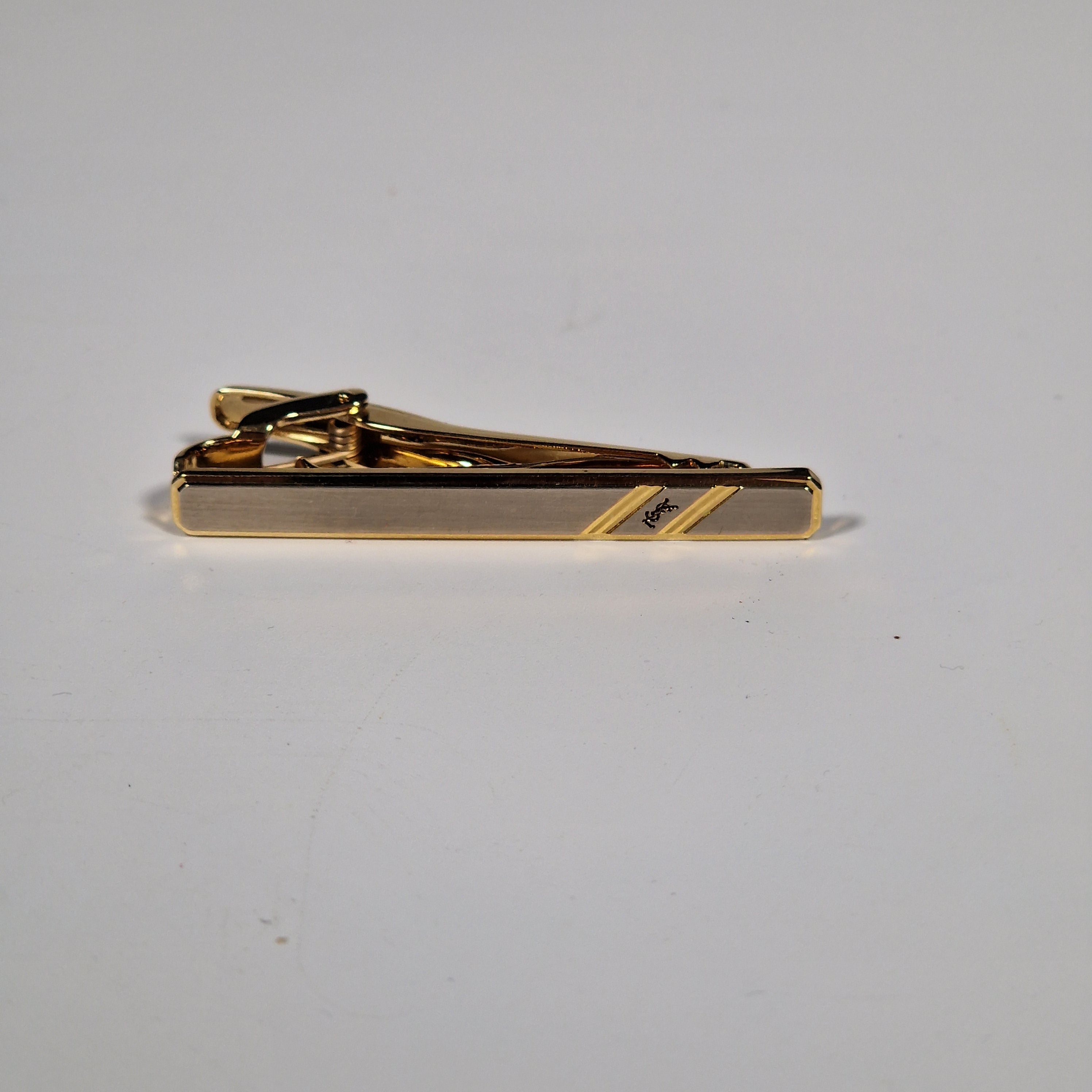Yves Saint Laurent a tie pin with box.