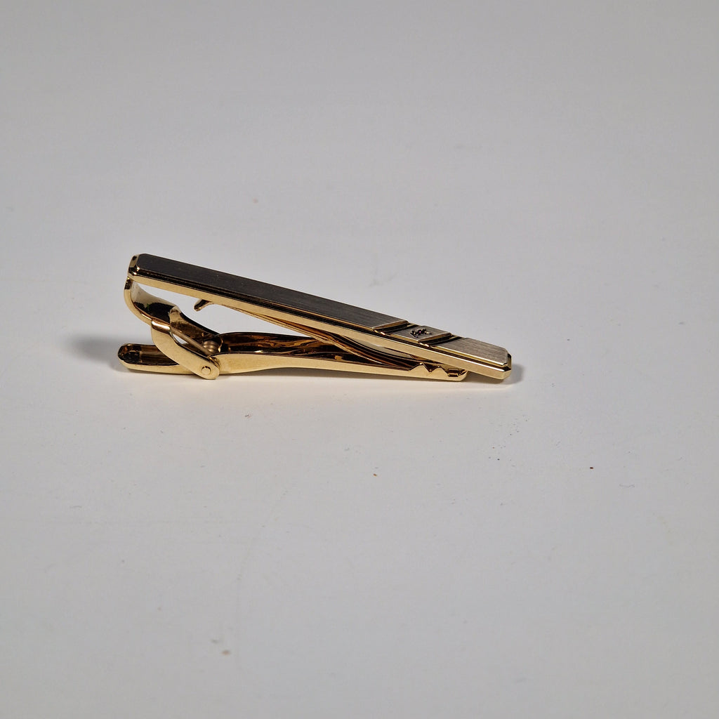 Yves Saint Laurent a tie pin with box.