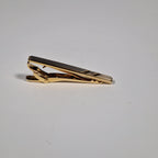 Yves Saint Laurent a tie pin with box.