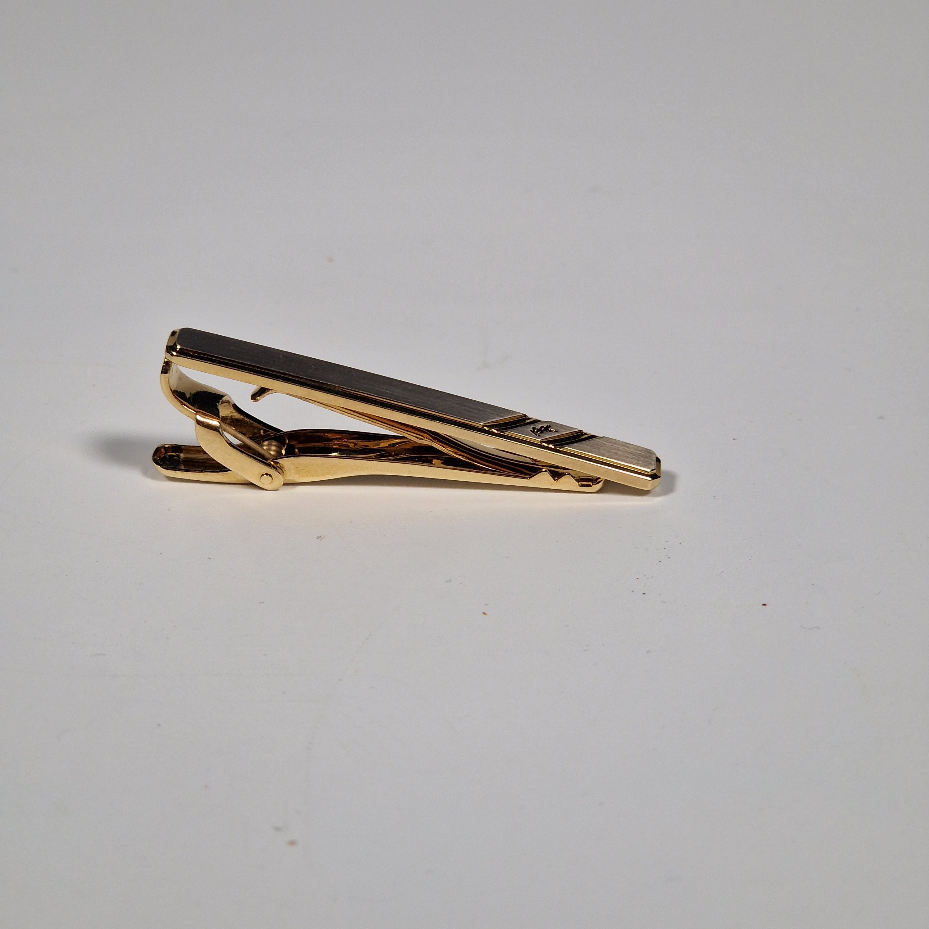Yves Saint Laurent a tie pin with box.