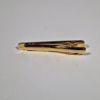 Yves Saint Laurent a tie pin with box.