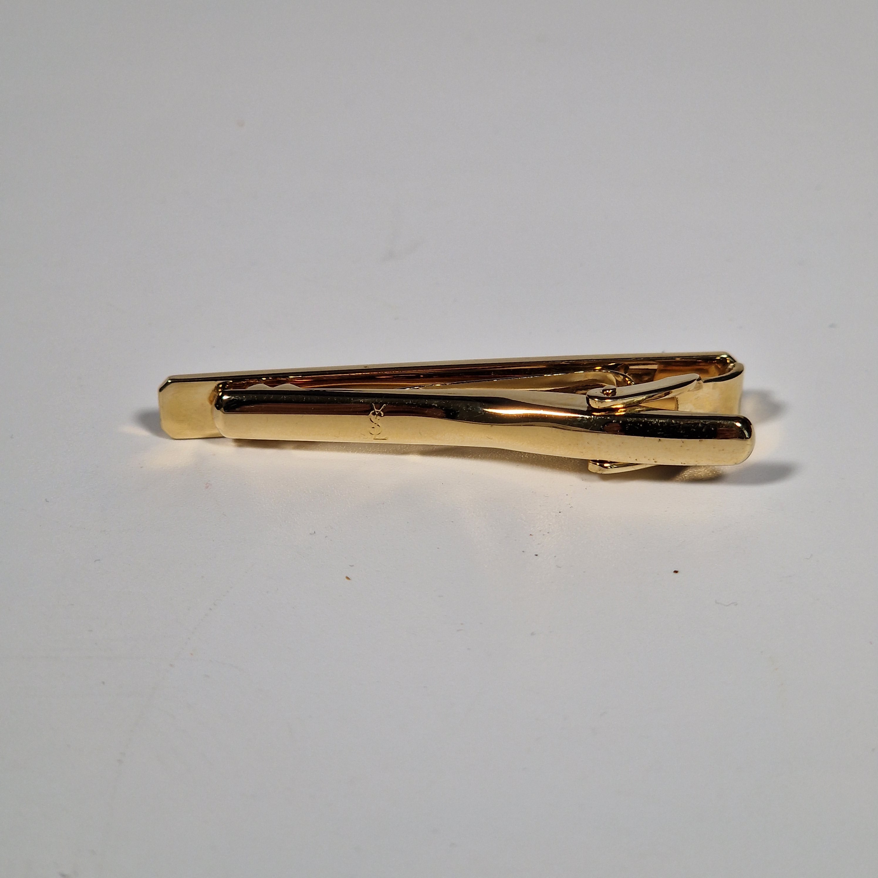 Yves Saint Laurent a tie pin with box.