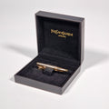Yves Saint Laurent a tie pin with box.