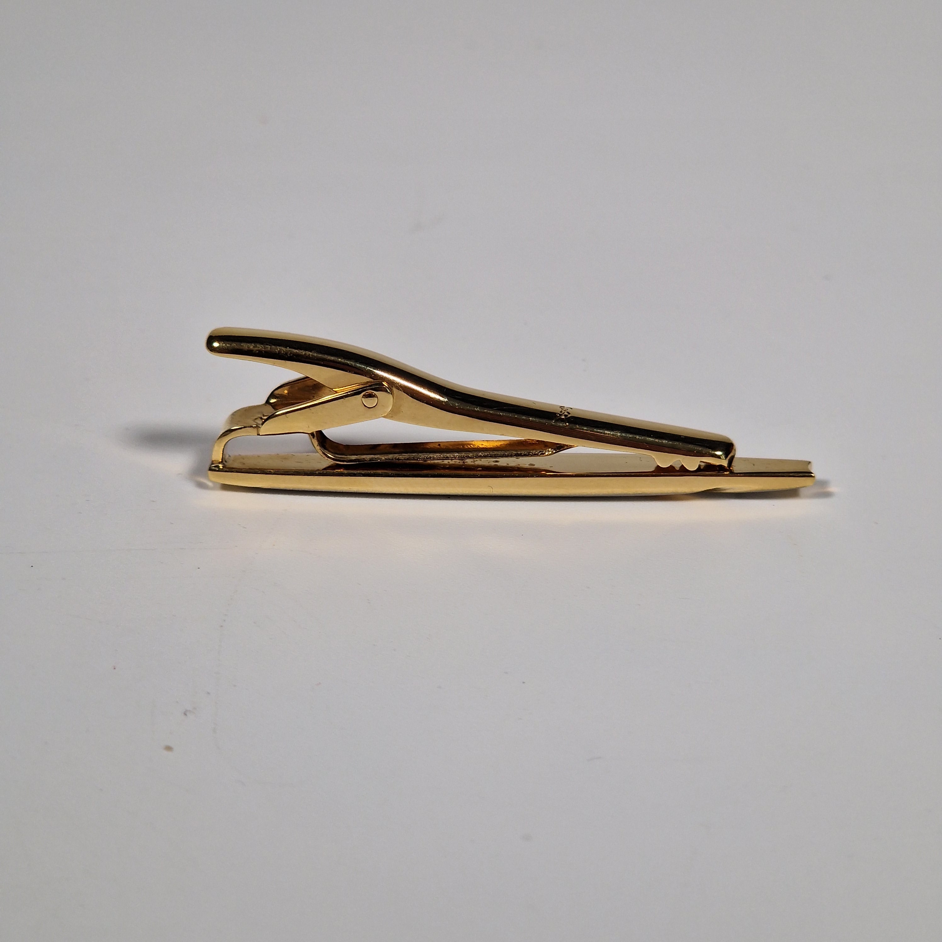 Yves Saint Laurent a tie pin with box.