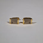 Yves Saint Laurent a pair of cufflinks with box.