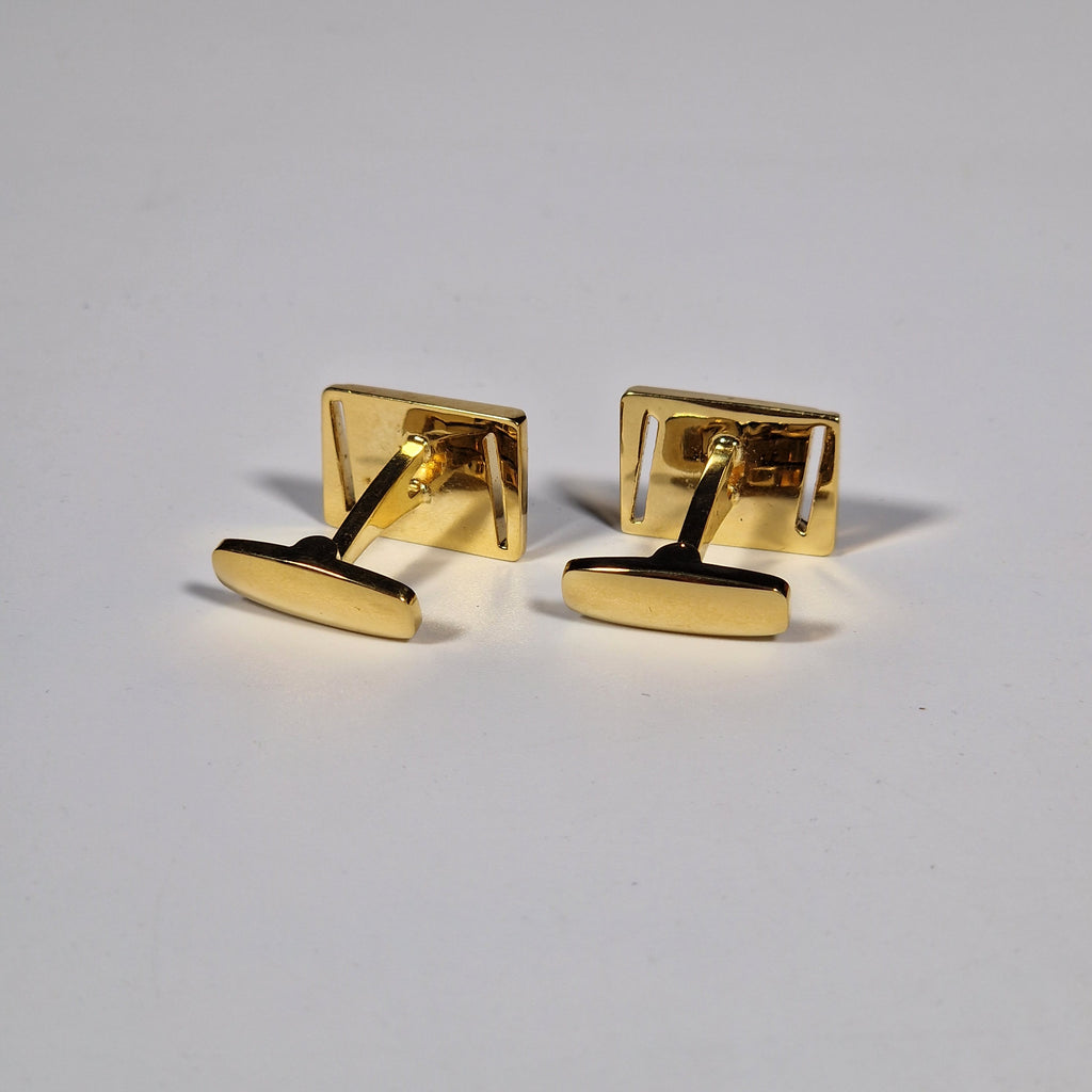 Yves Saint Laurent a pair of cufflinks with box.