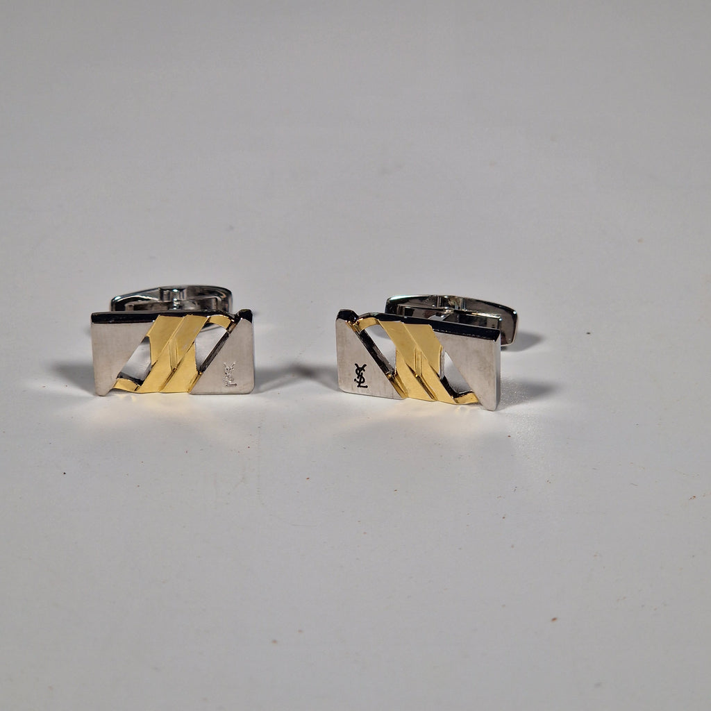 Yves Saint Laurent a pair of cufflinks with box.