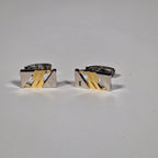 Yves Saint Laurent a pair of cufflinks with box.