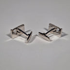 Yves Saint Laurent a pair of cufflinks with box.
