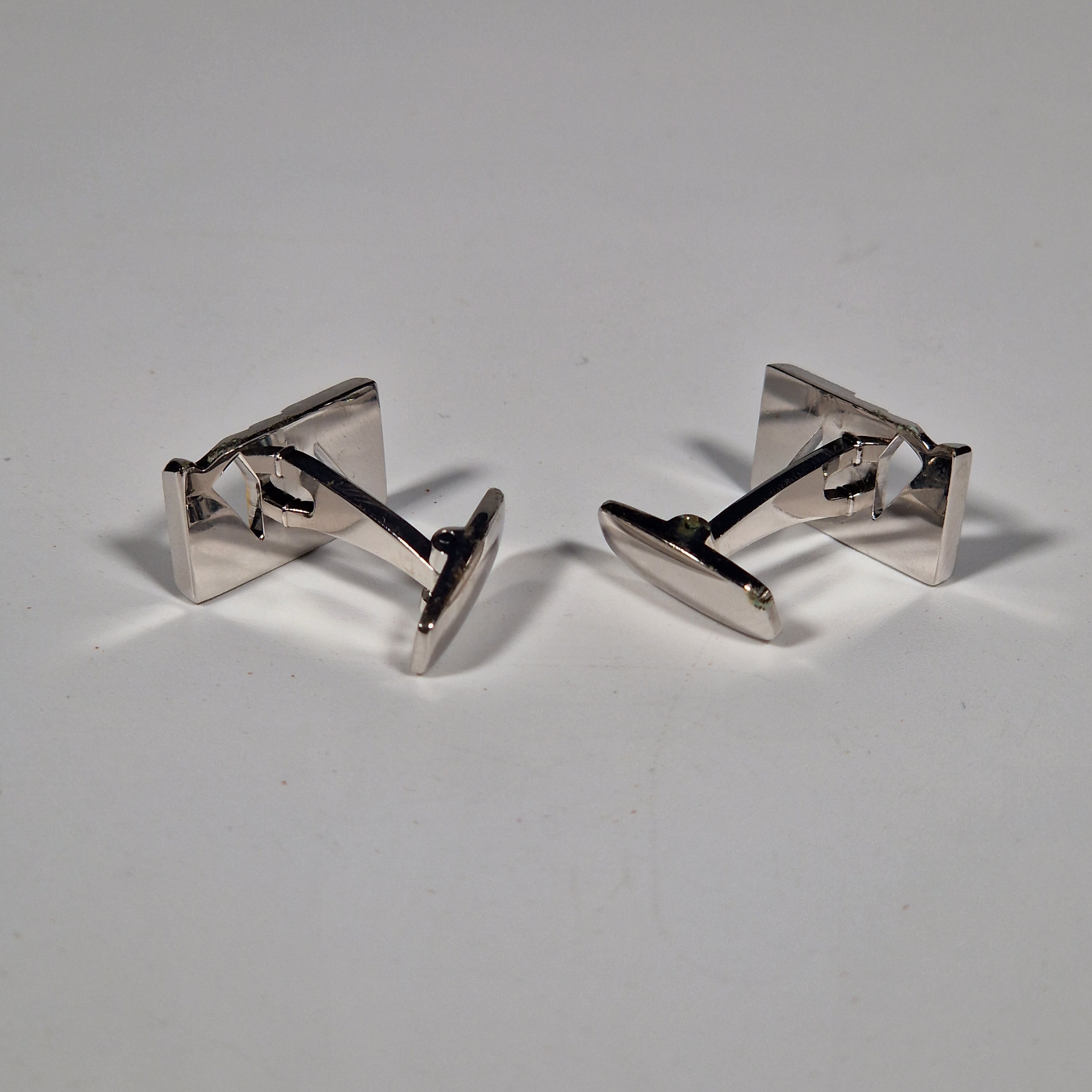 Yves Saint Laurent a pair of cufflinks with box.