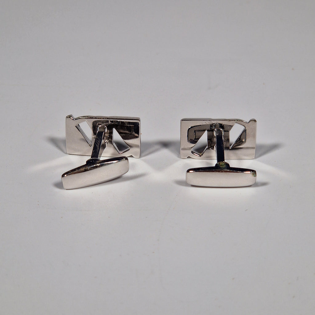 Yves Saint Laurent a pair of cufflinks with box.