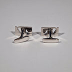 Yves Saint Laurent a pair of cufflinks with box.