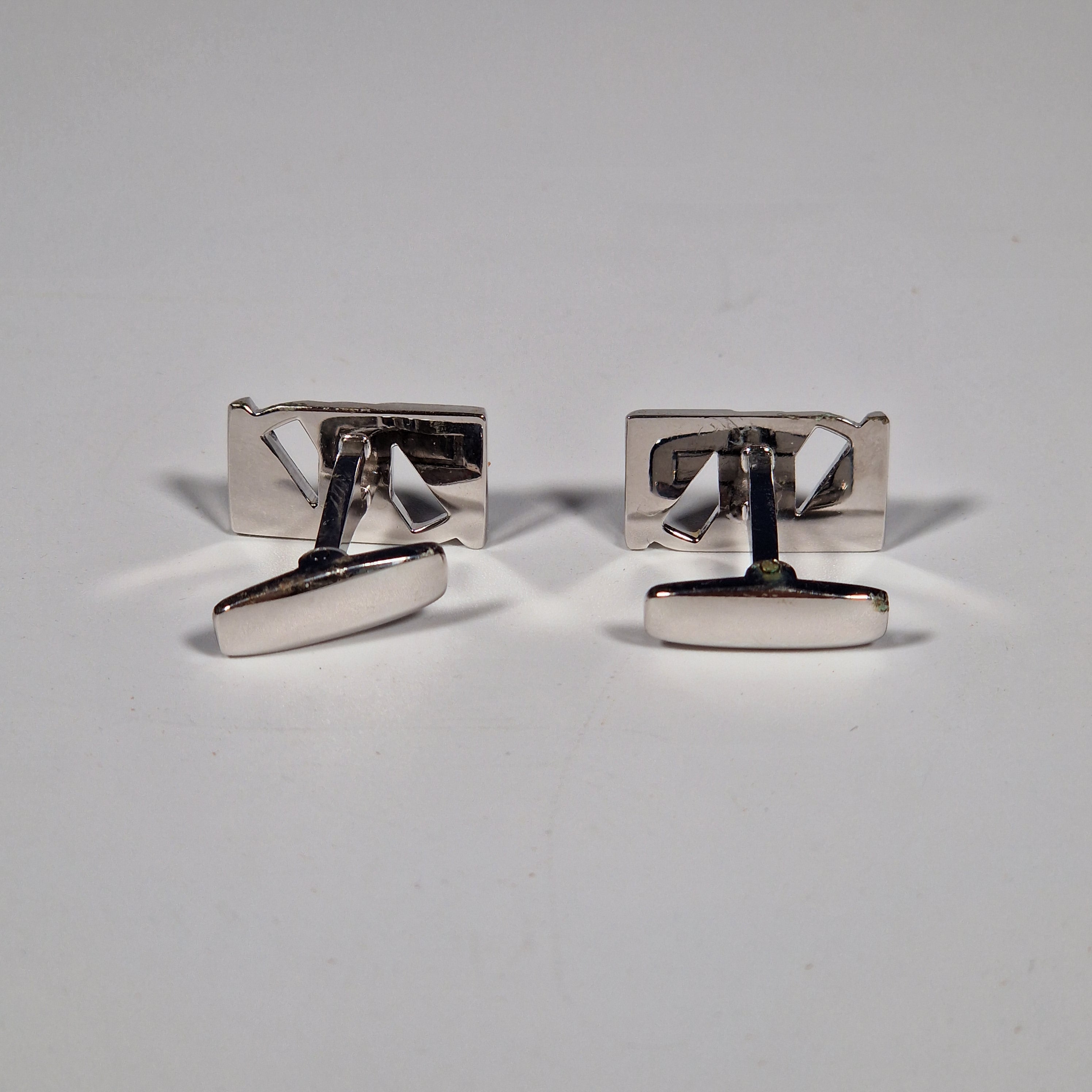 Yves Saint Laurent a pair of cufflinks with box.