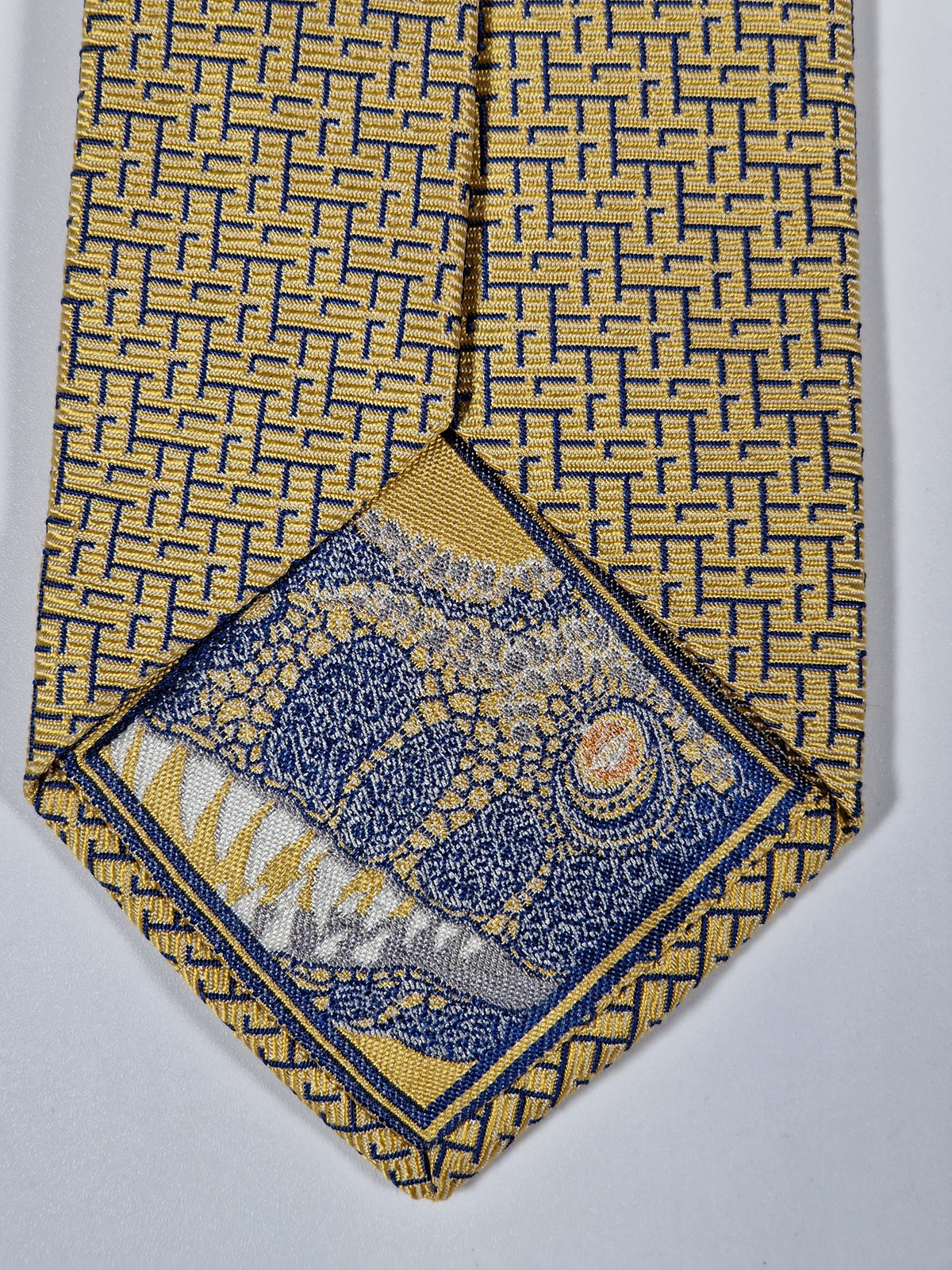 339301 Hermès tie yellow T-rex and H pattern 339301 T