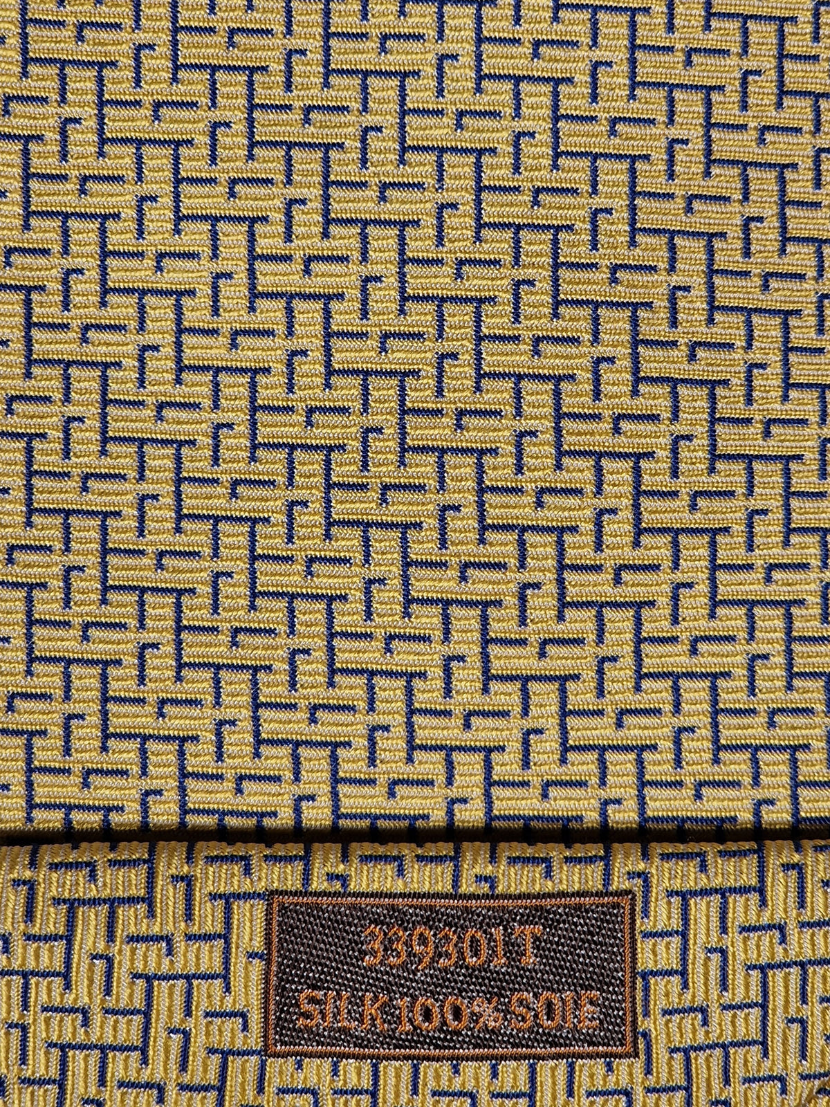 339301 Hermès tie yellow T-rex and H pattern 339301 T