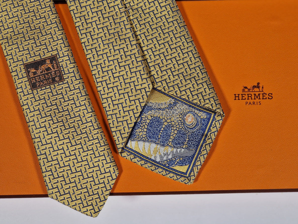 339301 Hermès tie yellow T-rex and H pattern 339301 T