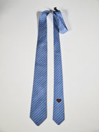 Hermès silk tie blue chain and hearts pattern 339360 T