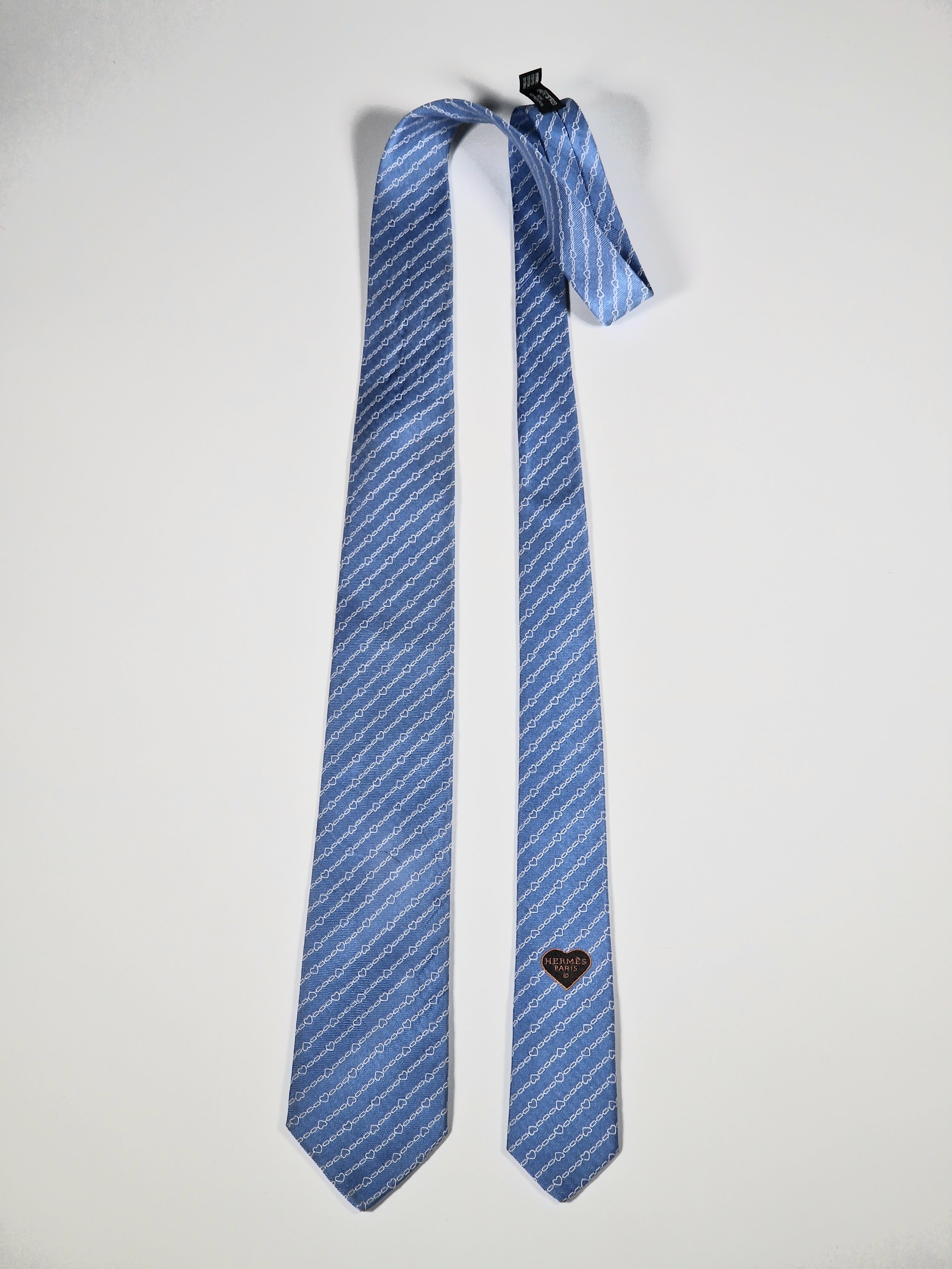 Hermès silk tie blue chain and hearts pattern 339360 T