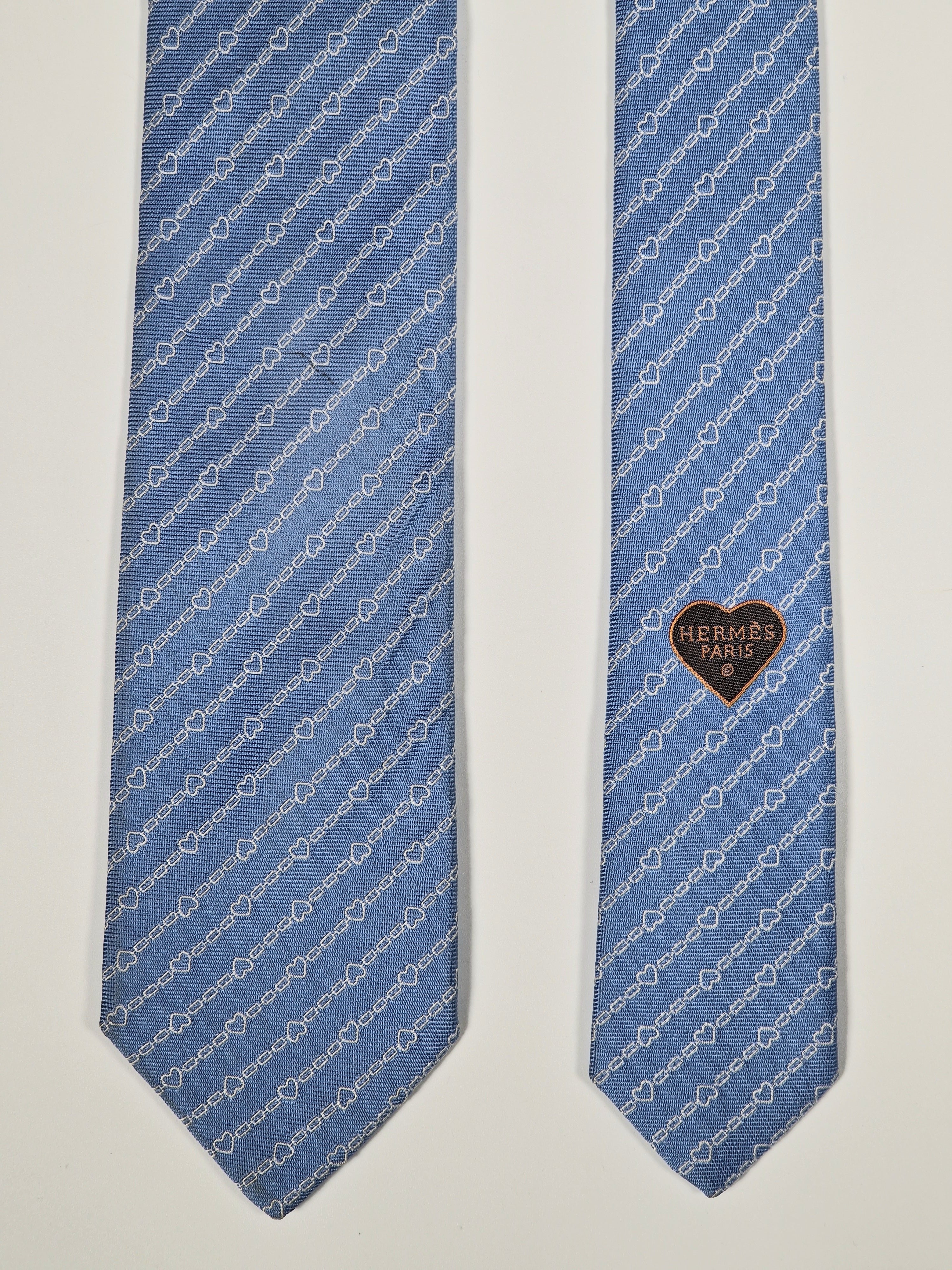 Hermès silk tie blue chain and hearts pattern 339360 T