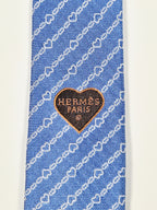Hermès silk tie blue chain and hearts pattern 339360 T