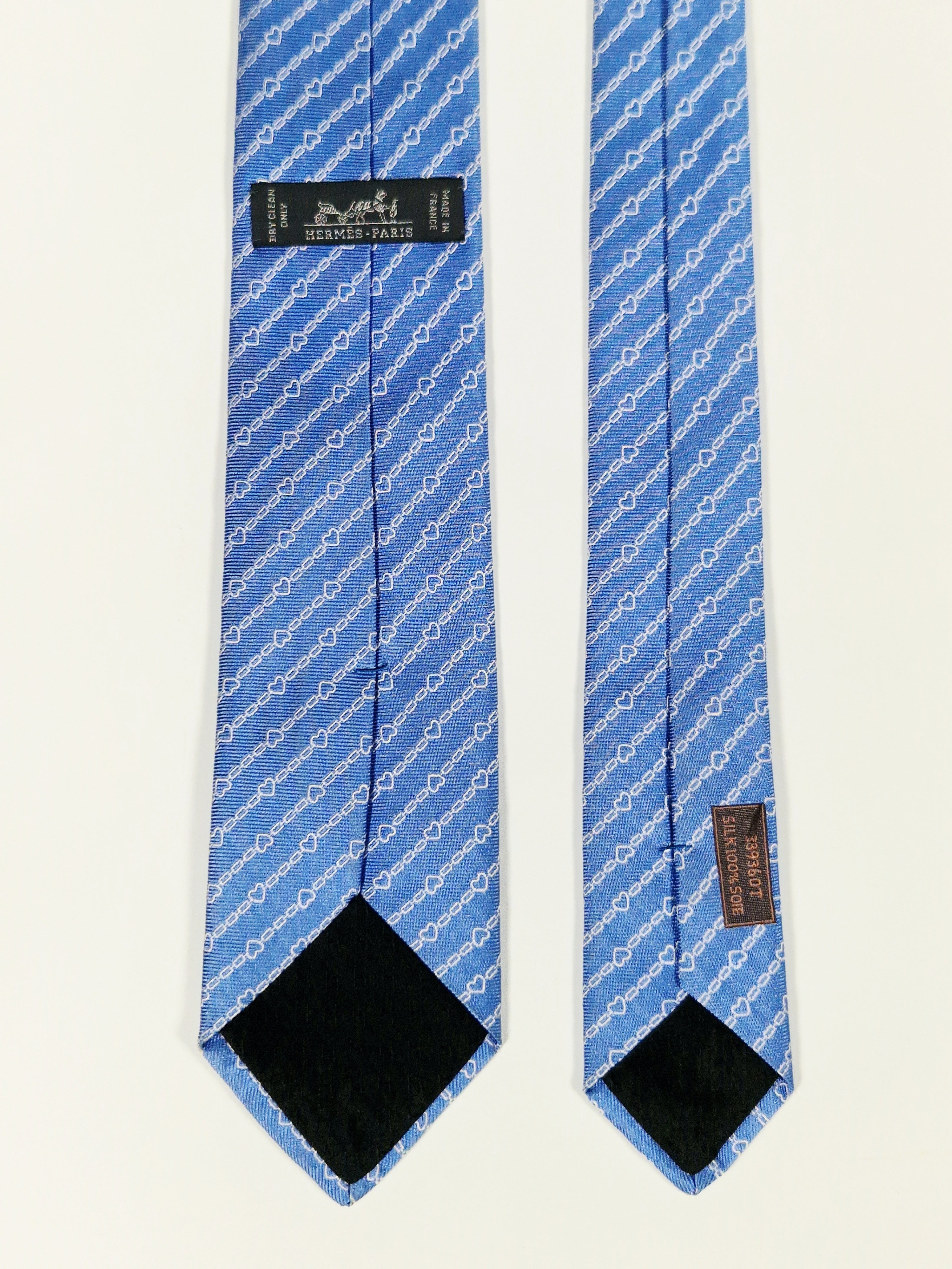 Hermès silk tie blue chain and hearts pattern 339360 T